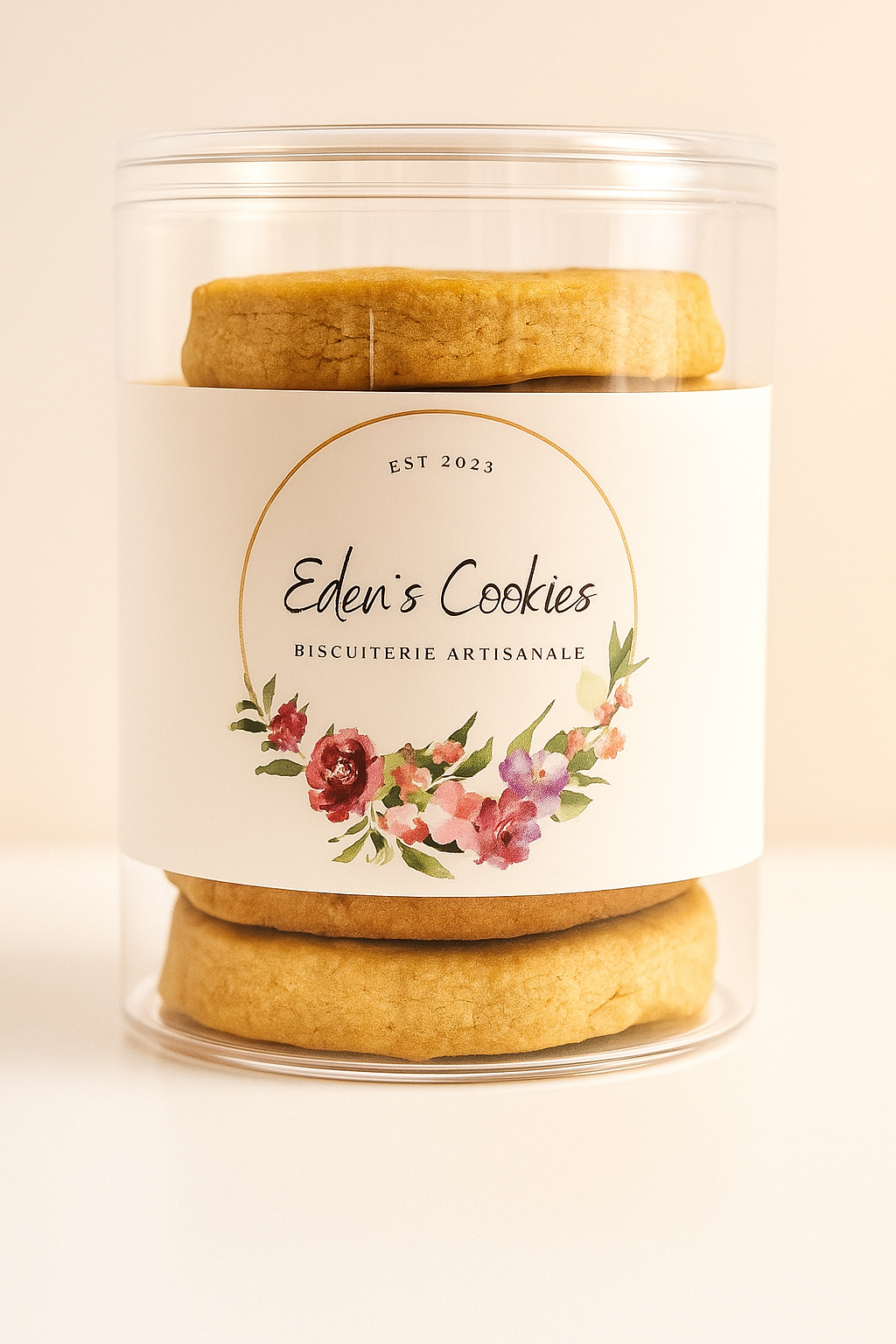 Jar of cookies with a floral label on a beige background